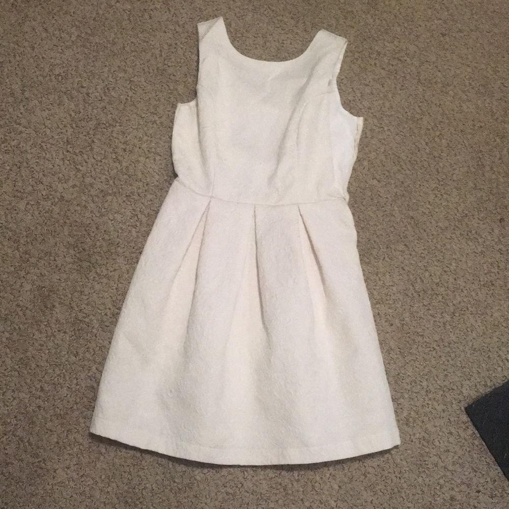 adorable white dress with bow tie back